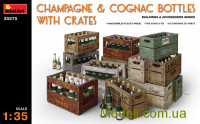 Бутылки шампанского и коньяка с ящиками